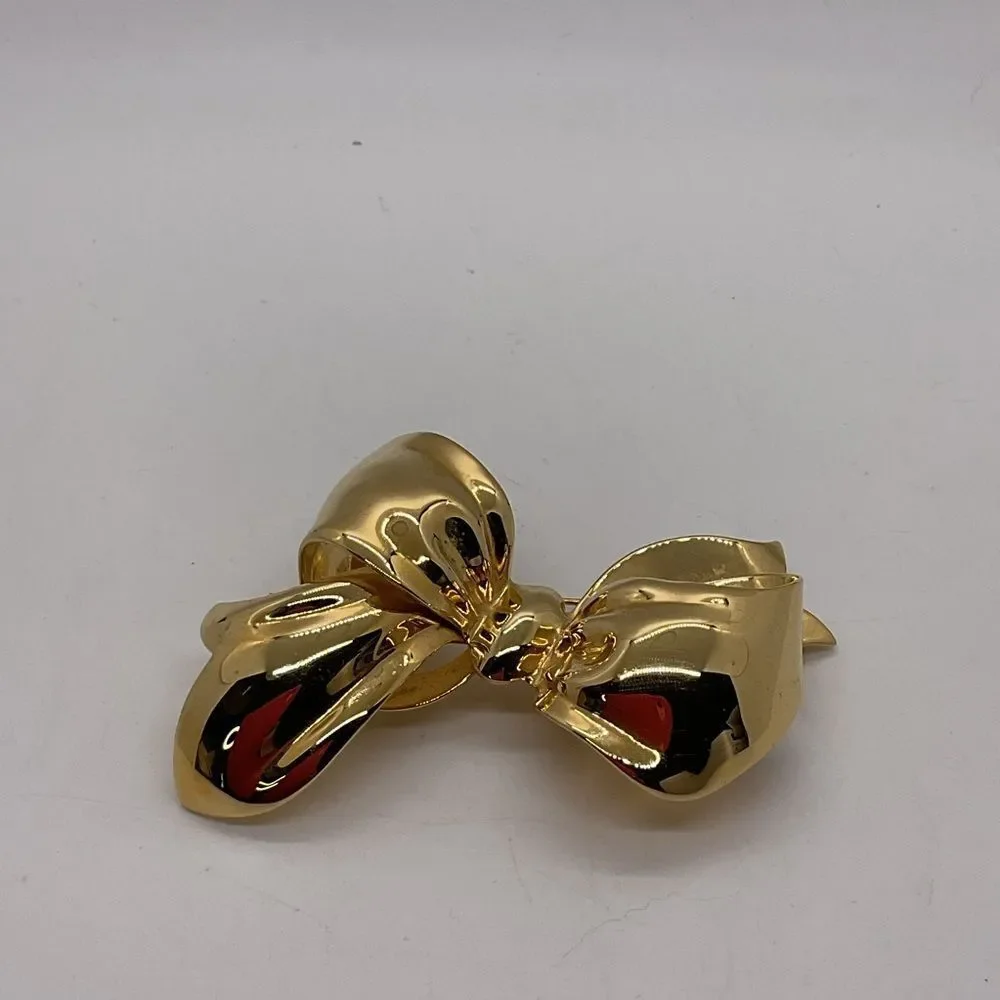 Monet Gold Toned Bow Brooch
